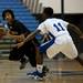 Dexter junior London Truman looks for an open lane in the game against Lincoln on Tuesday, Jan. 29. Daniel Brenner I AnnArbor.com